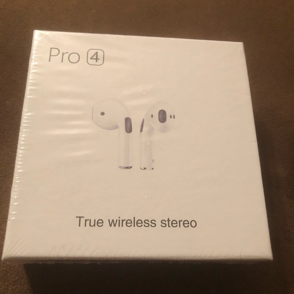 New in box Pro4 True Wireless Stereo Headphones. White. Includes charging case.